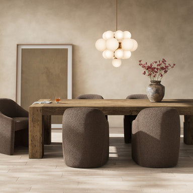 Abaso rustic wormwood oak dining table in modern dining room setting with pendant lighting.