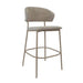 Taupe bar stool with upholstered seat and back, taupe metal legs and footrest