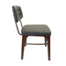 Dark gray upholstered side chair with tufted back and light wood legs