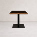 Metal table base with central pedestal column and square base plate, dark finish
