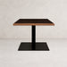 Table base with tall pedestal column and wide square base plate, dark metal