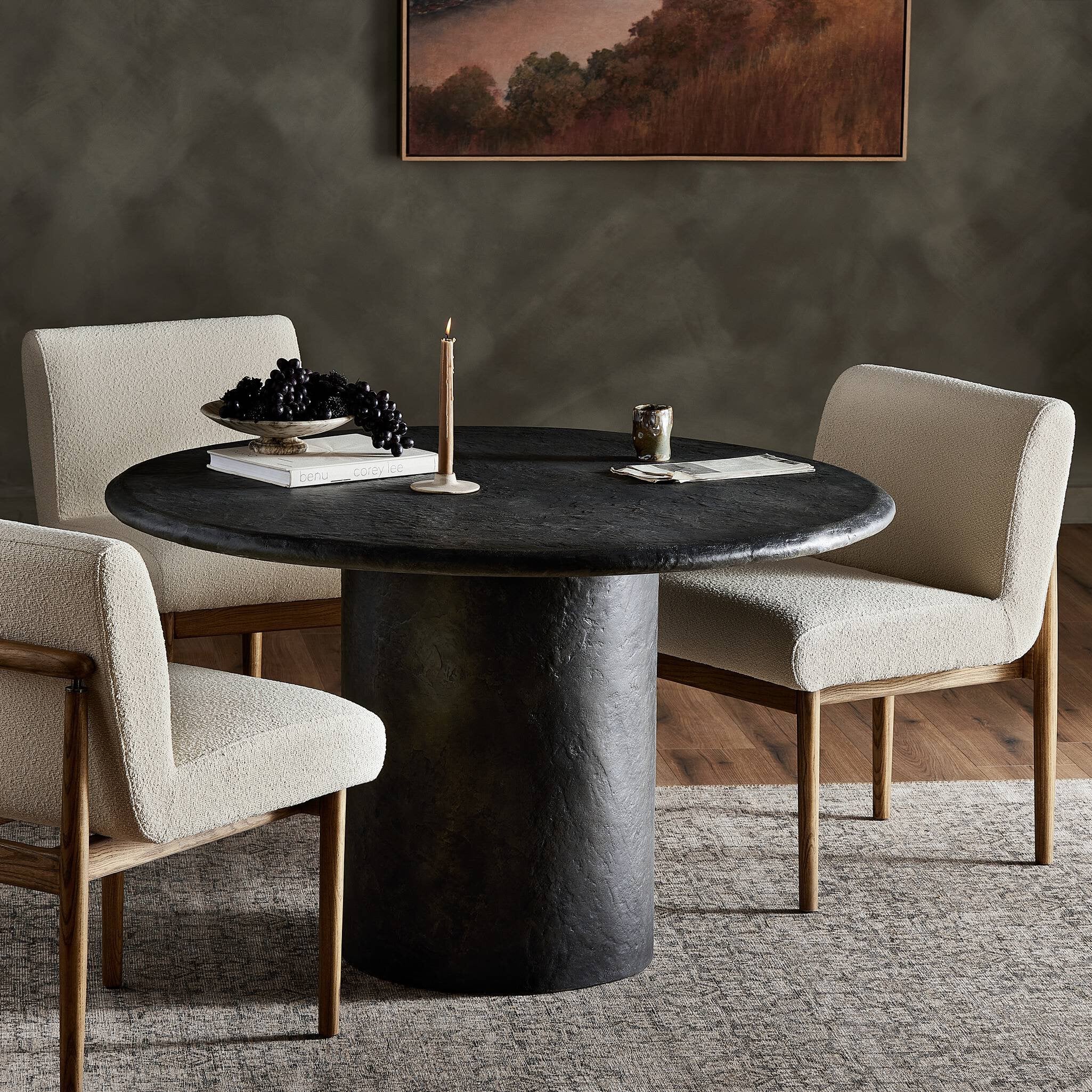 Bonnie dining table 48.5 in with round textured black concrete top and central pedestal