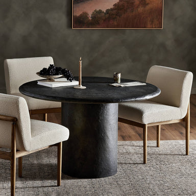 Bonnie dining table 48.5 in with round textured black concrete top and central pedestal