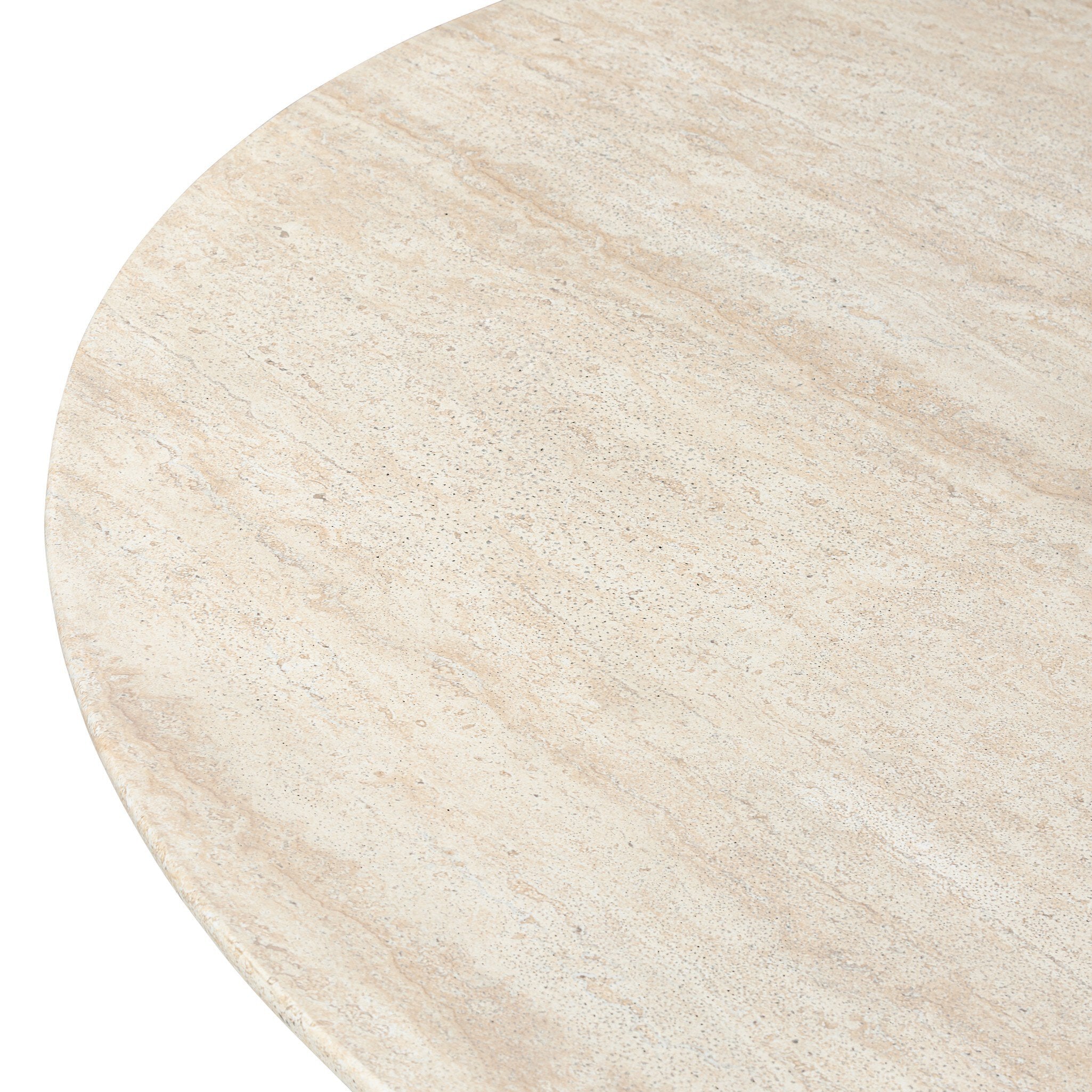 Close-up of round faux travertine dining table top, light beige stone-like texture