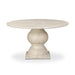Round dining table with faux travertine top and turned pedestal base in light beige