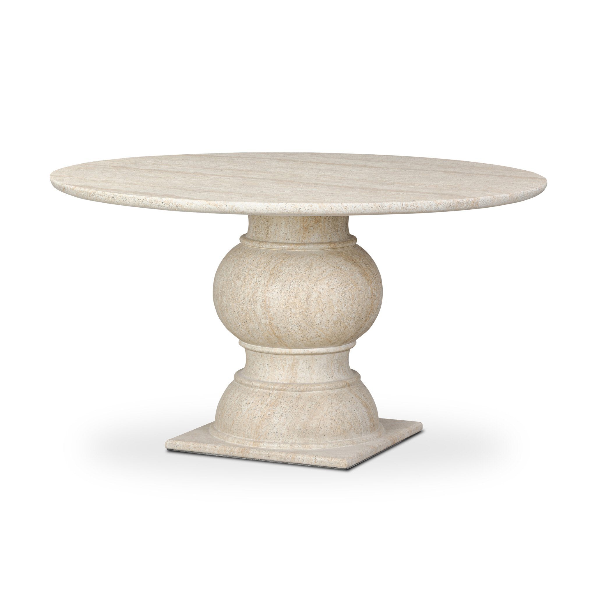 Round dining table with light beige faux travertine top and sculpted pedestal base