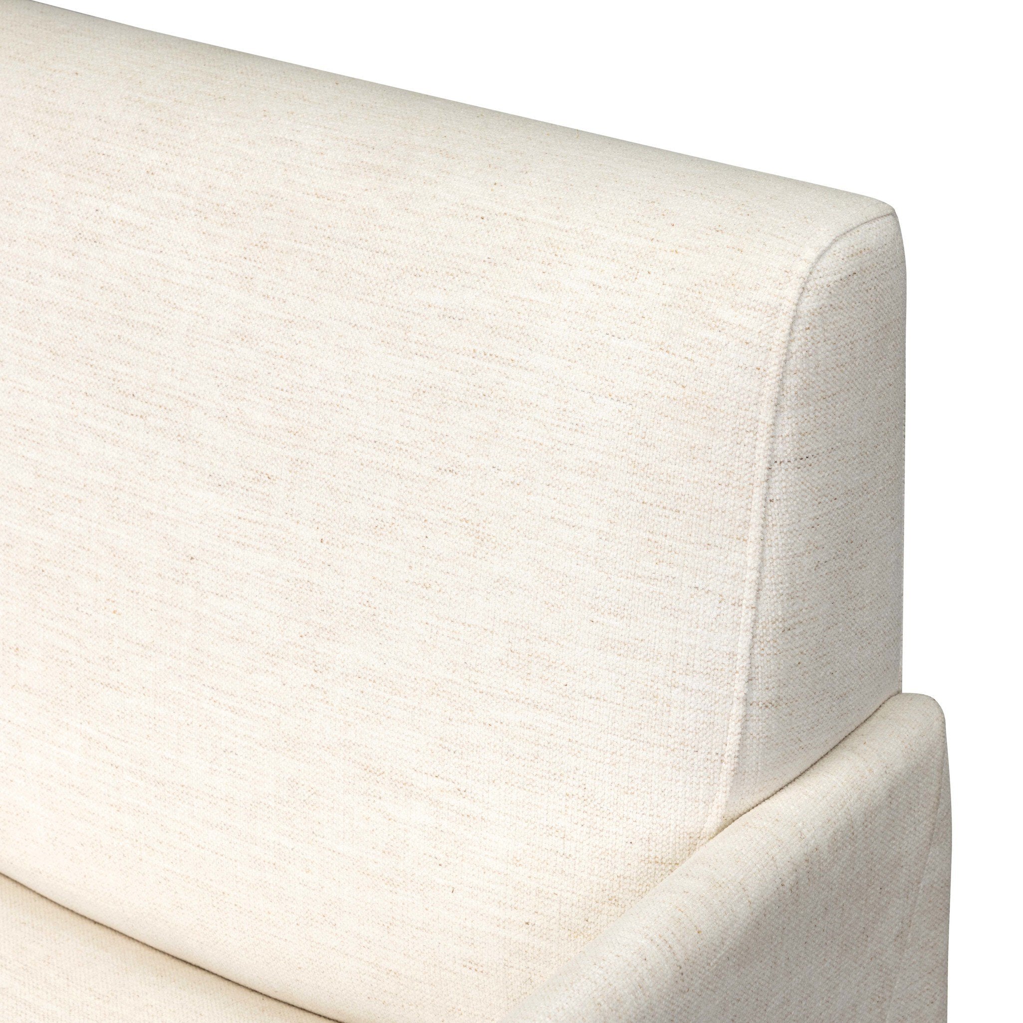 Close-up of off-white upholstered chair backrest fabric and curved arm support.