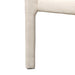 Upholstered dining chair with tapered legs and light textured fabric upholstery