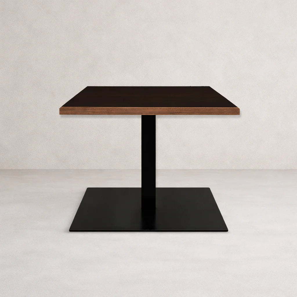 Pedestal table base with dark column and rectangular base plate, centered