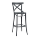 Slate bar stool with curved top rail, X-back, round seat, and circular footrest.