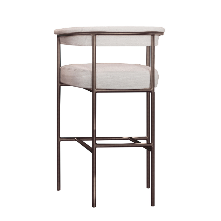 Upholstered bar stool with light fabric seat and back, bronze-toned metal frame and base.