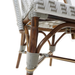 Nautilus side chair arm and leg close-up with gray wrap sleeves and woven back