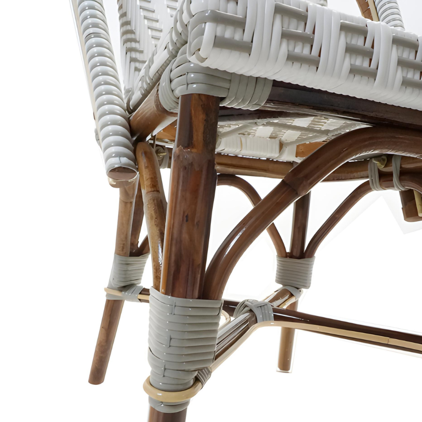 Nautilus side chair arm and leg close-up with gray wrap sleeves and woven back