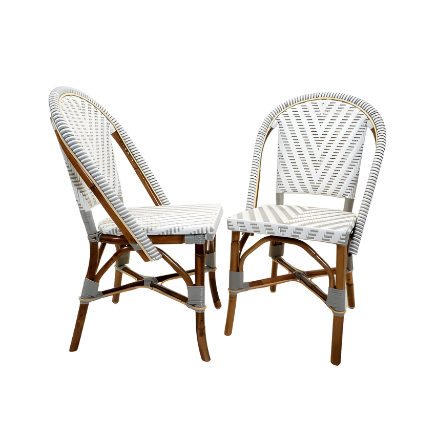 Pair of Nautilus side chairs with white-gray woven seats, curved backs, light wood legs