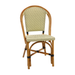 Rattan side chair with curved back and arms, beige woven seat with black dot texture