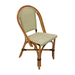 Rattan side chair with curved arms, woven beige back and seat with black dot pattern