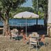Arm chair with armrests, light gray seat and back slats, outdoor use
