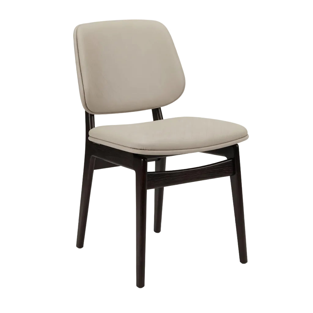 Upholstered side chair with light beige seat and back, dark wood frame and tapered legs