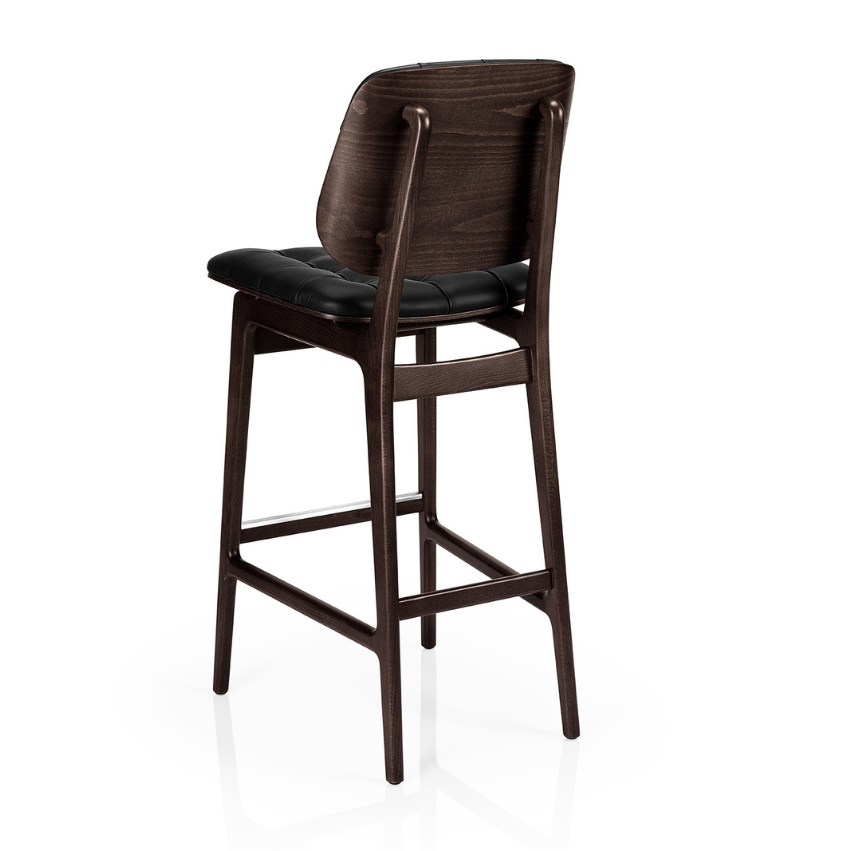 Tufted bar stool with black cushioned seat, dark brown tufted back, and wood frame