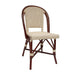 Side chair with curved dark wood arms and cream woven back and seat.