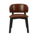 Editor side chair with brown upholstered seat and rounded back, black legs