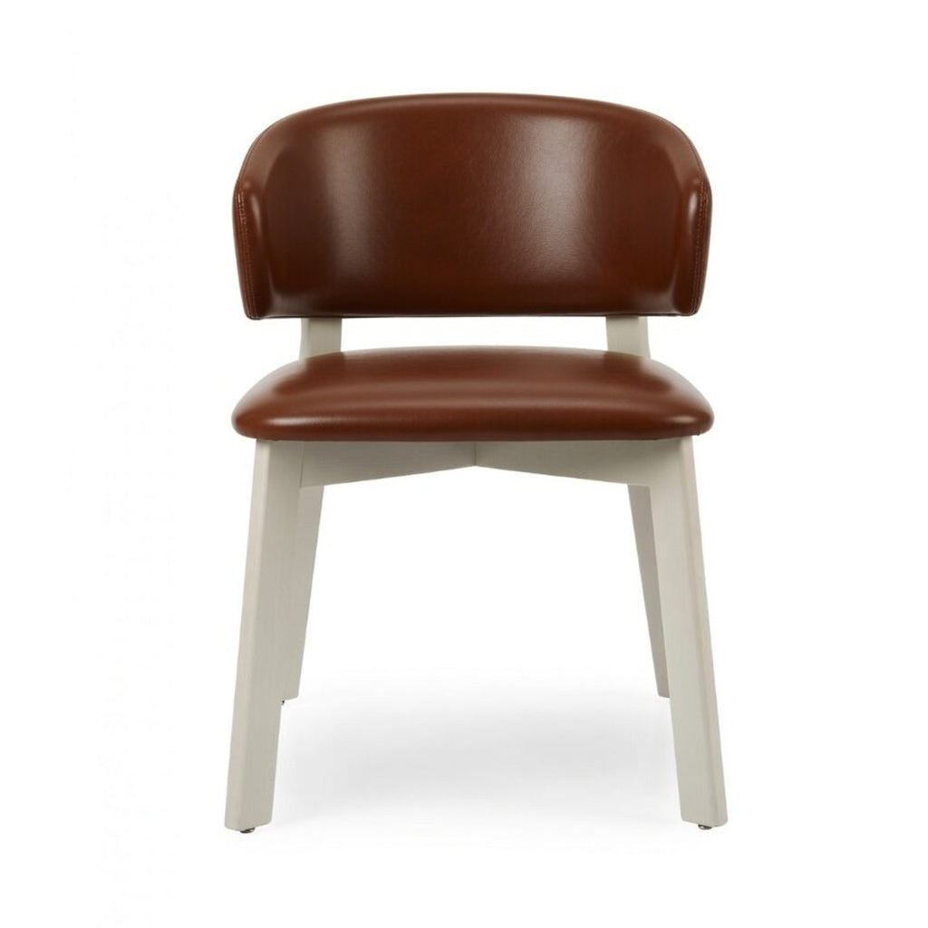 Editor side chair with brown upholstered seat and rounded back, white legs