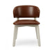 Editor side chair with brown upholstered seat and rounded back, white legs