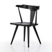 Black wooden chair on a white background. Ripley Dining Chair in Black Oak with mid-century Windsor-style sculptural silhouette.