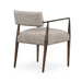 Angled Backside Waldon Dining Chair in Toasted Ash with textured ivory upholstery and an architectural wood frame