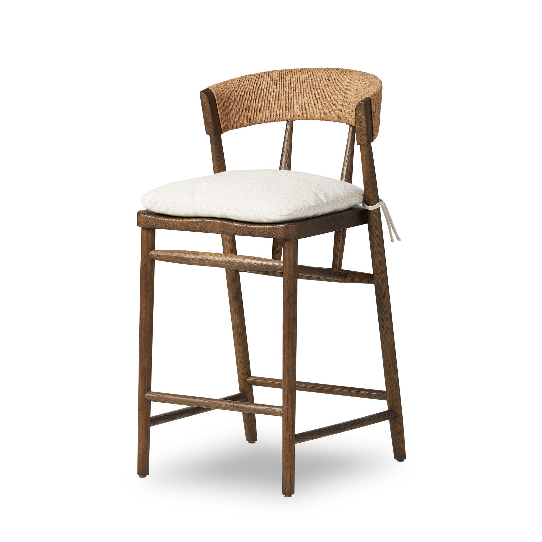 Angled Buxton Bar Counter Stool in solid ash with a hand-wrapped paper rush backrest