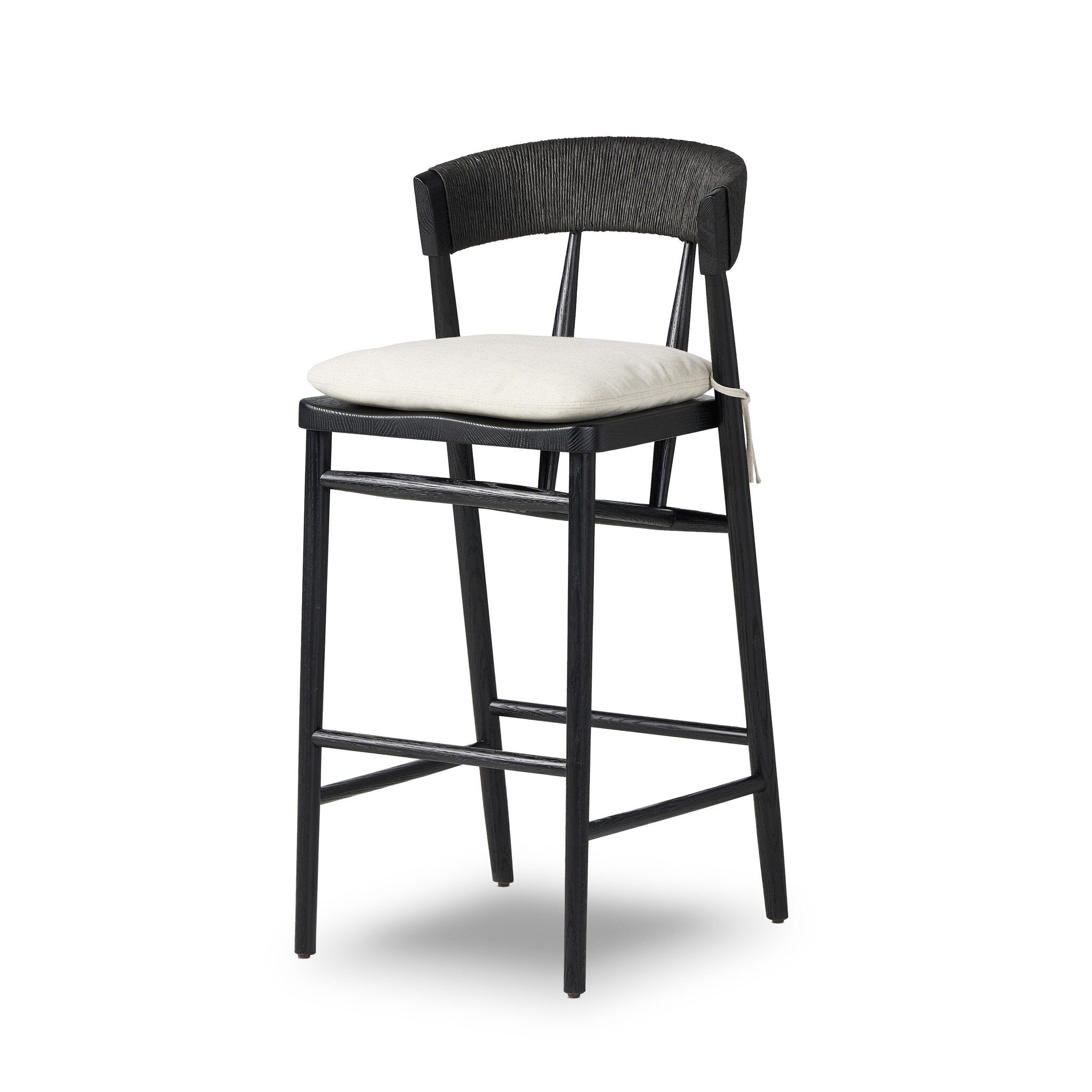 Bar stool with curved black upholstered back and cream padded seat