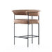 Tan counter stool with padded round seat and back, supported by black metal frame