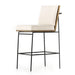 Bar stool with light cushion, black metal base, wood back and side arms
