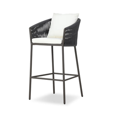 Angled Contemporary coastal outdoor counter stool featuring handwoven grey rope and architectural metal base