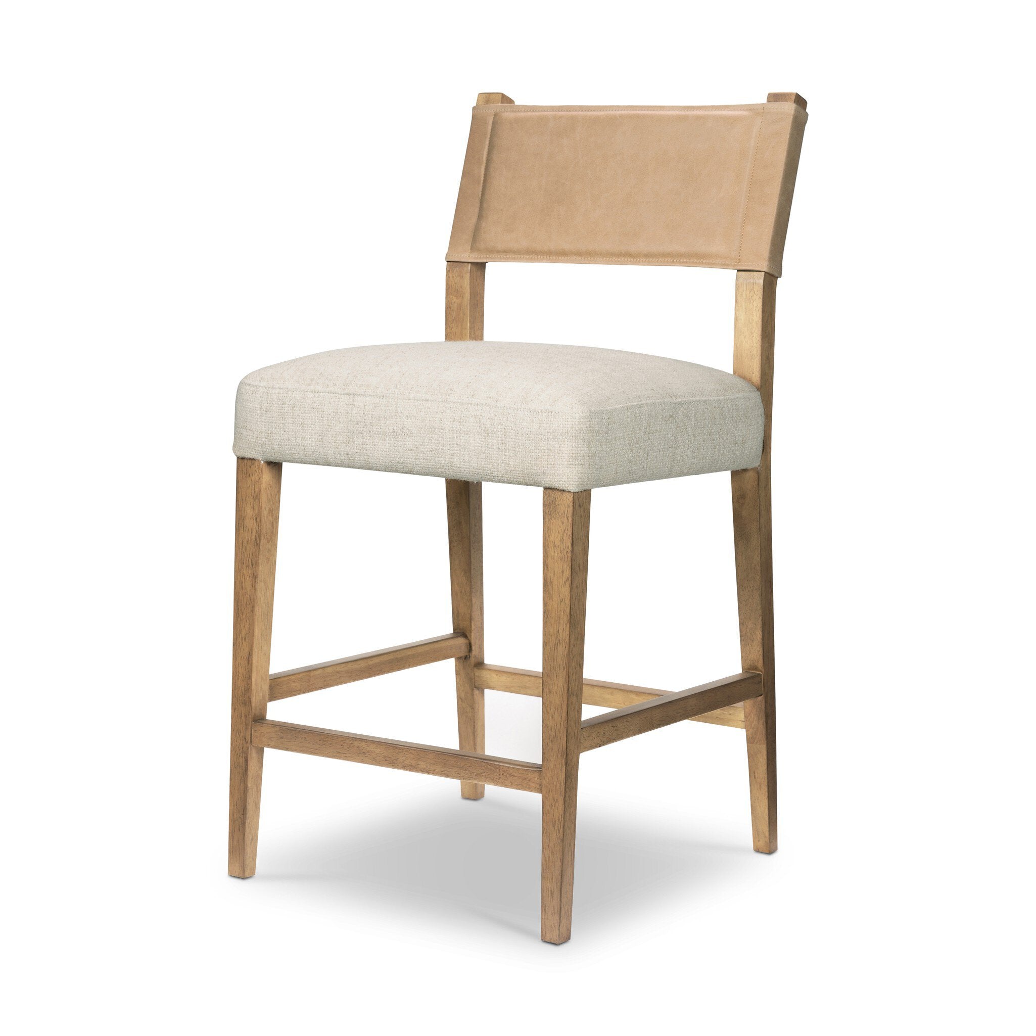 Side view of cream counter stool with tan leather-look back and wooden legs