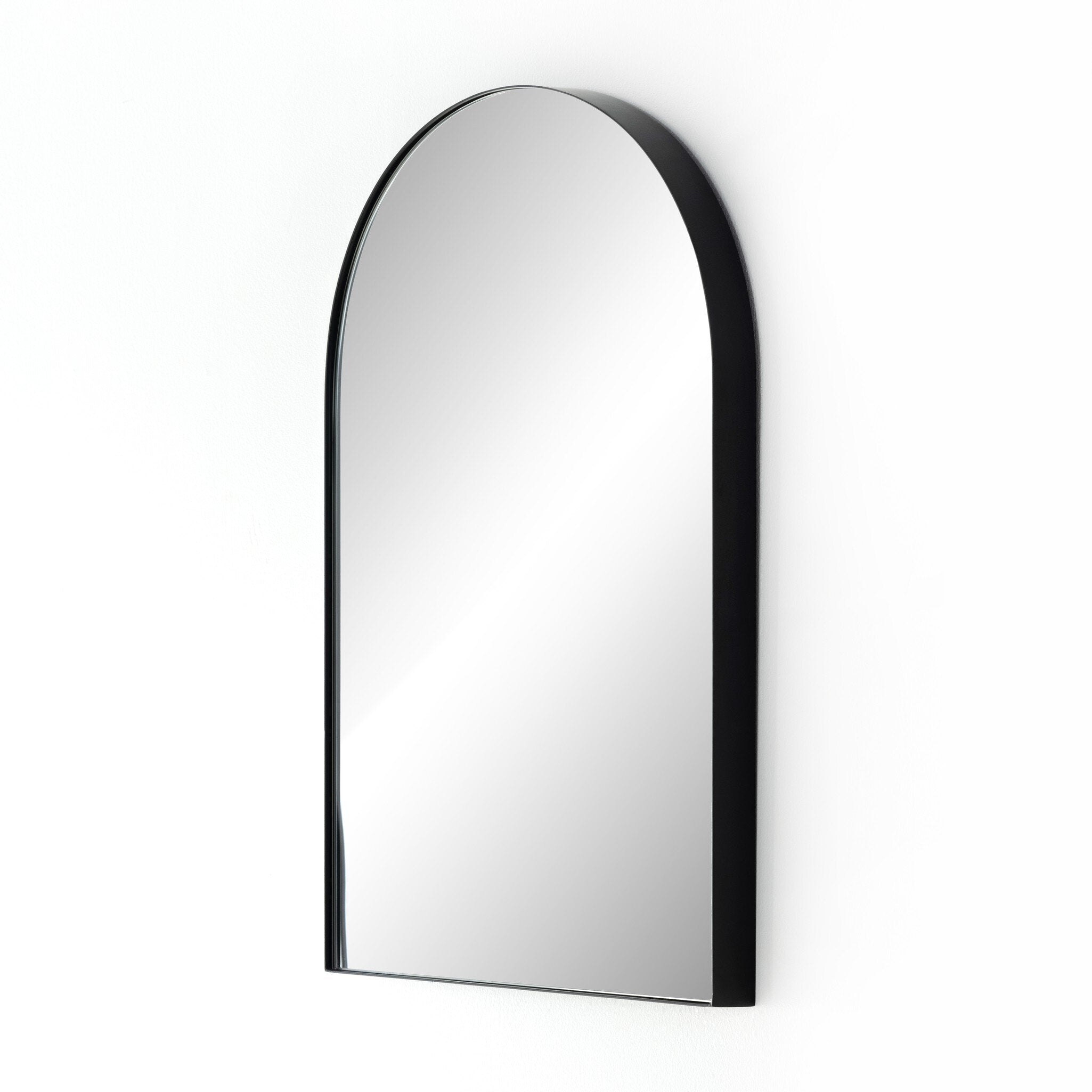 Angled Georgina Small Arch Mirror featuring a 21-inch iron frame with a durable matte black finish