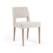 Armless dining chair with light camel textured upholstery, padded seat, and wooden legs.