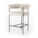 Upholstered counter stool with light camel fabric back and seat; black metal base