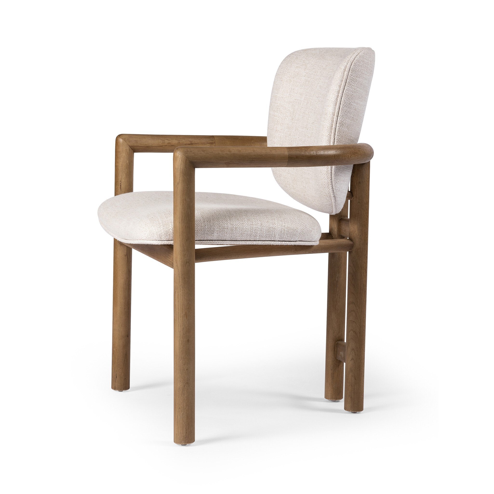 Angled Madeira three-legged dining chair featuring a tubular frame and a curved barrel backrest in cream upholstery