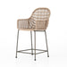 Angled Modern low-armed outdoor dining chair with white wicker weaving and a bronze industrial frame for hospitality