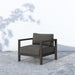 Angled Modern low-slung Sonoma Outdoor Chair featuring weather-resistant rope and solid teak wood