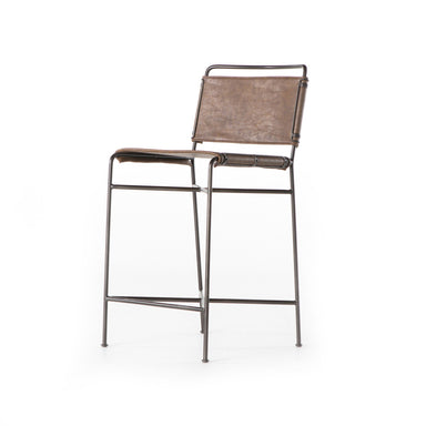 Angled Wharton Counter Stool featuring Distressed Brown faux leather and industrial steel legs