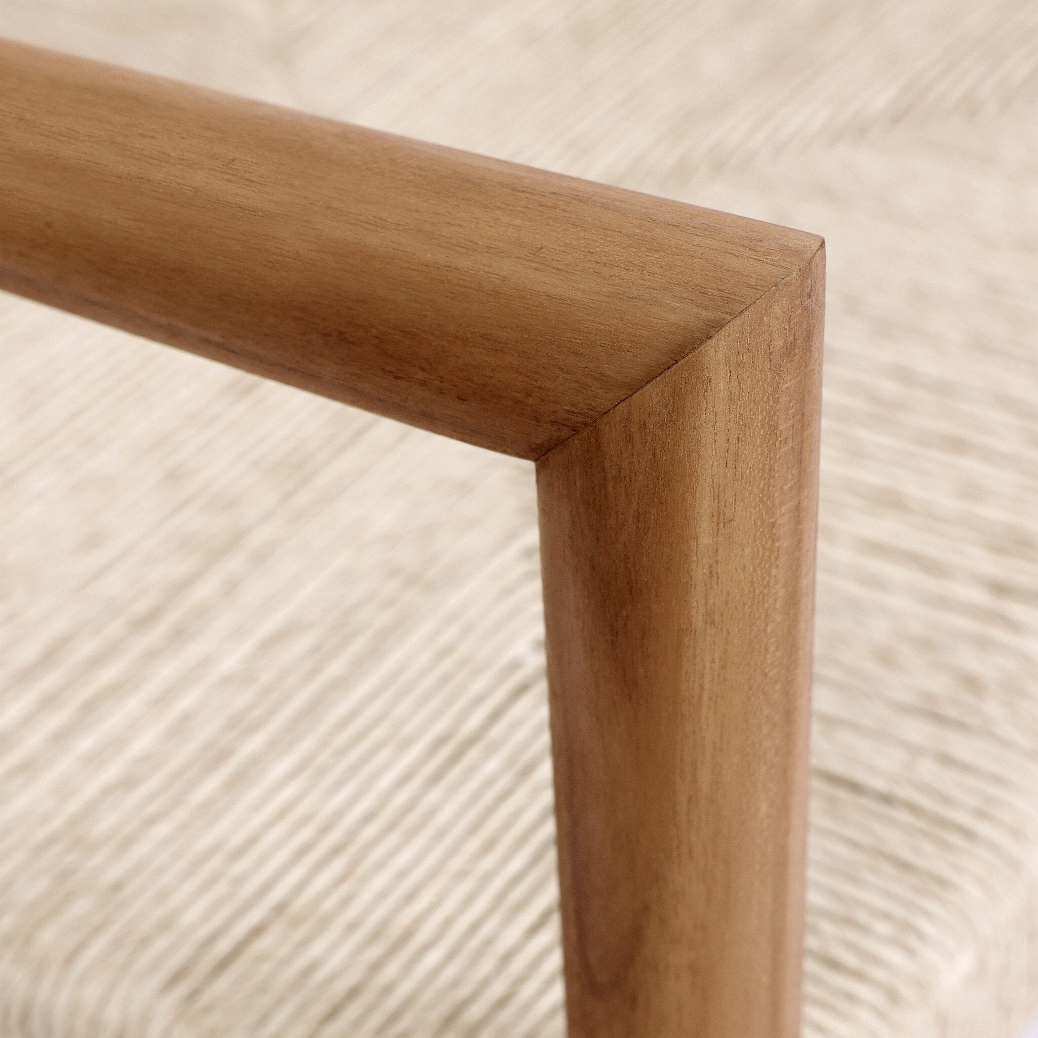 Arm Detail Lomas Outdoor Dining Armchair in Vintage White woven wicker with a tapered natural teak frame