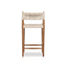 Outdoor bar counter stool with vintage white woven back and seat cushion on wood frame