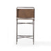 Back Wharton Counter Stool featuring Distressed Brown faux leather and industrial steel legs