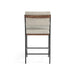 Upholstered counter stool with light gray seat and back, black frame, wood accents