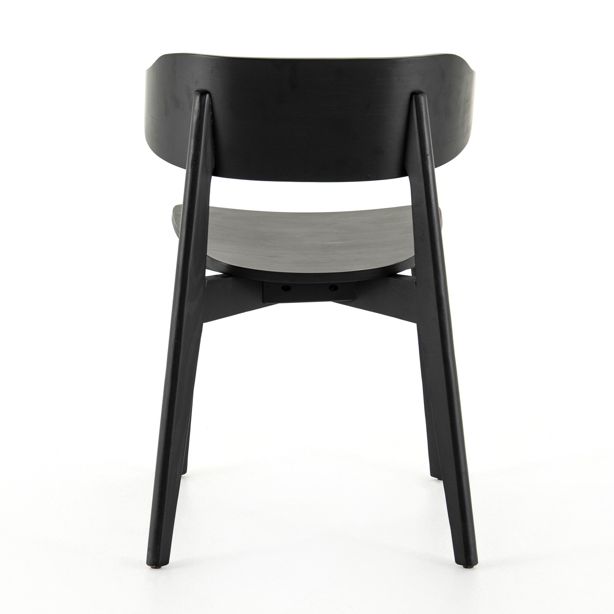 Black armless dining chair front view with curved backrest and round seat