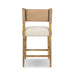 Cream upholstered counter stool with tan backrest and wooden base