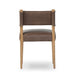 Brown armless dining chair front view with upholstered seat, back panel, and wood legs.