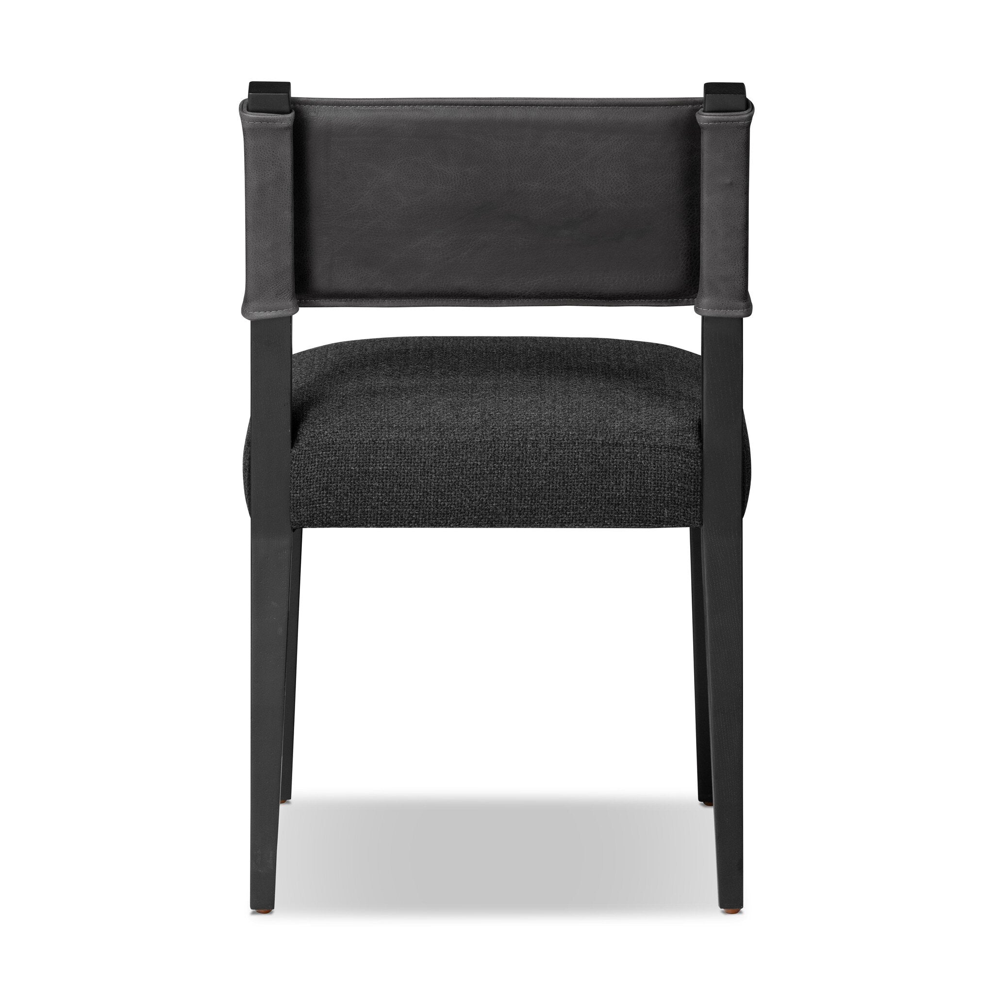 Armless dining chair with gray fabric seat, dark upholstered back, and straight legs